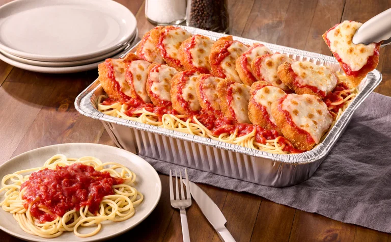Chicken Parmigiana serves 4 to 6 people topped with marinara sauce and mozzarella cheese