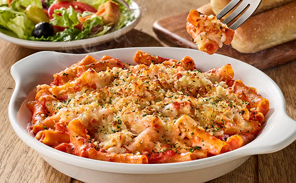 Baked Five Cheese Ziti al Forno pasta with rich tomato sauce and melted cheese