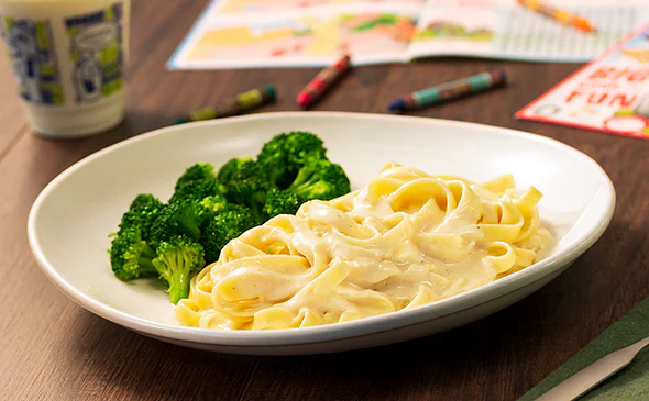 Kids Alfredo sauce with choice of vegetarian pasta served hot and creamy