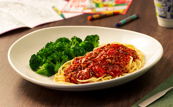 Kids pasta meal with meat sauce served hot with choice of noodles