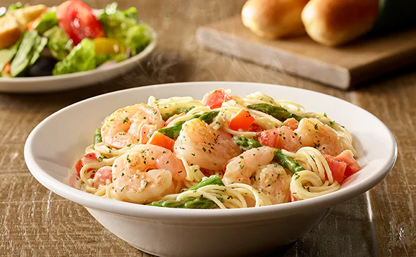 Garlic butter Shrimp Scampi pasta recipe served with lemon and parsley