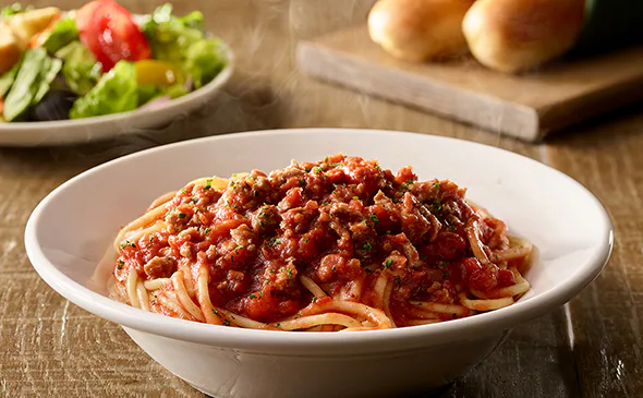 Classic Italian spaghetti pasta served with rich tomato sauce