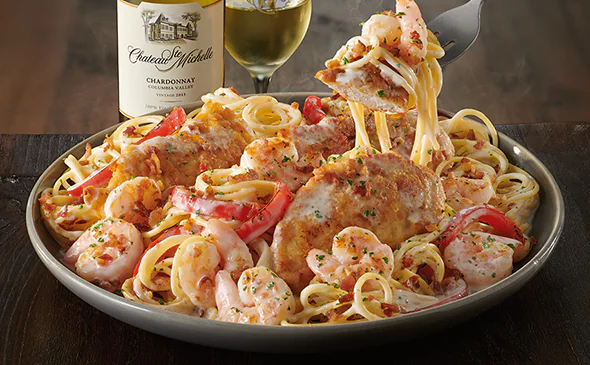 Creamy Chicken and Shrimp Carbonara pasta recipe with bacon and parmesan sauce