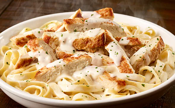 Creamy Chicken Alfredo pasta recipe served with fettuccine and parmesan cheese