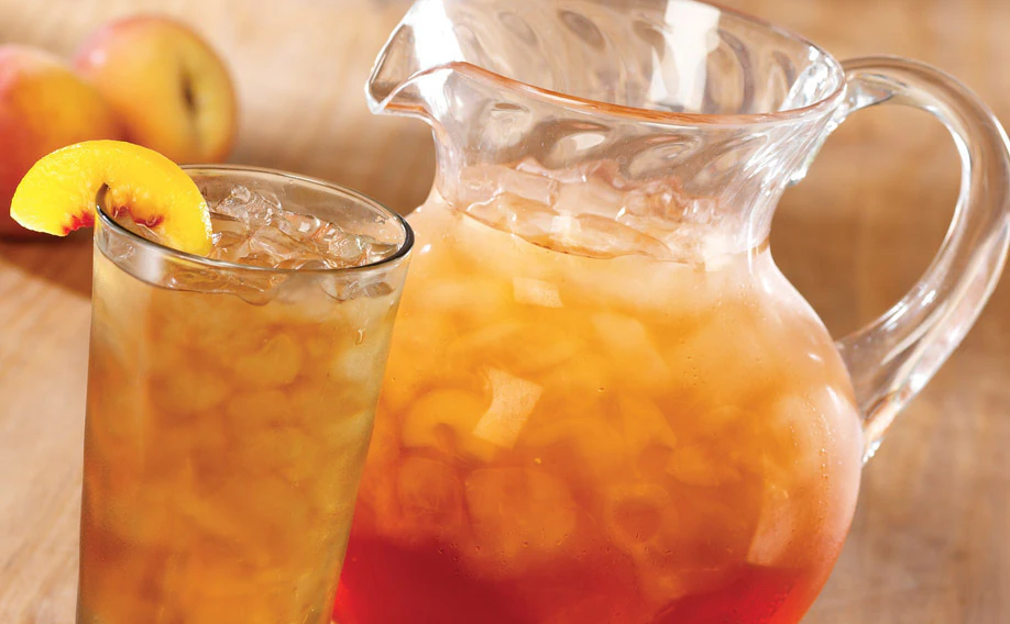 Gallon iced teas and raspberry lemonade beverages served cold and refreshing