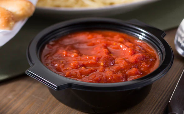 Large side of marinara sauce served with rich tomato and garlic flavor