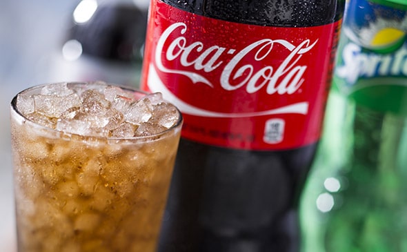 2-liter soda bottle served chilled available in assorted flavors
