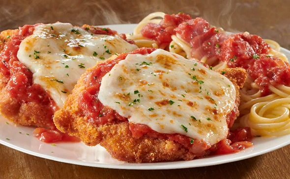 Crispy Chicken Parmigiana topped with marinara sauce and melted mozzarella cheese