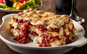 Traditional Lasagna Classico layered with rich meat sauce, creamy béchamel, and melted cheese